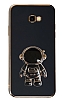Eiroo Astronot Samsung Galaxy J4 Plus Standl Siyah Silikon Klf